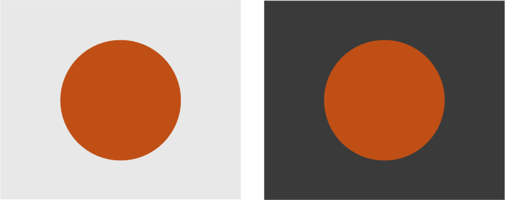 Two orange circles are placed side-by-side, the one on the left has a white background and the one on the right has a black background.